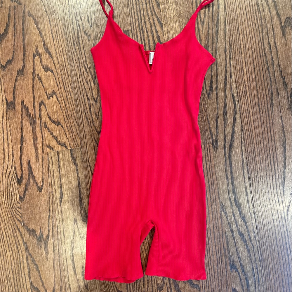 Red ribbed romper. Fitted. Size S.